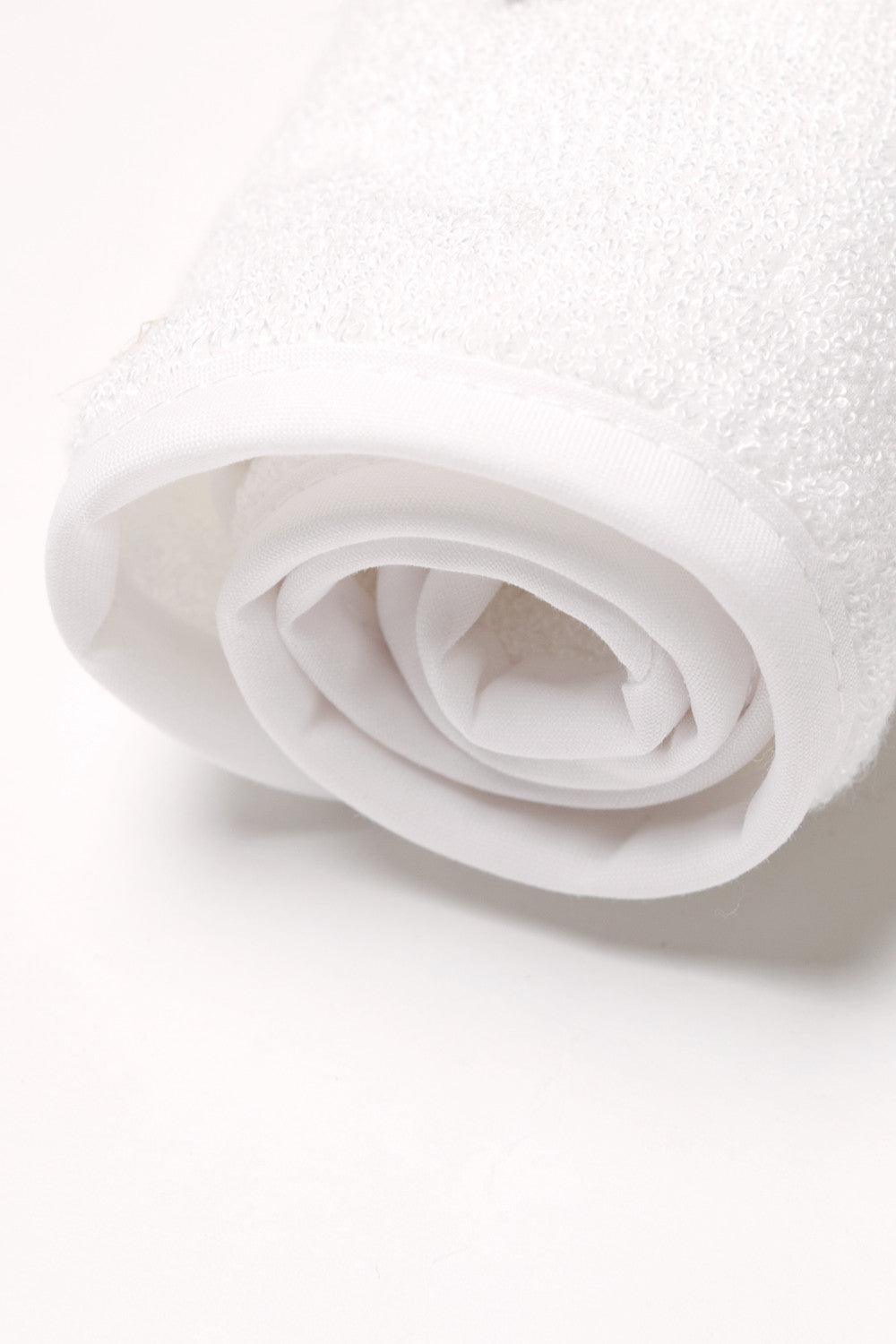 Plain white bamboo baby washcloths with trimmed edges