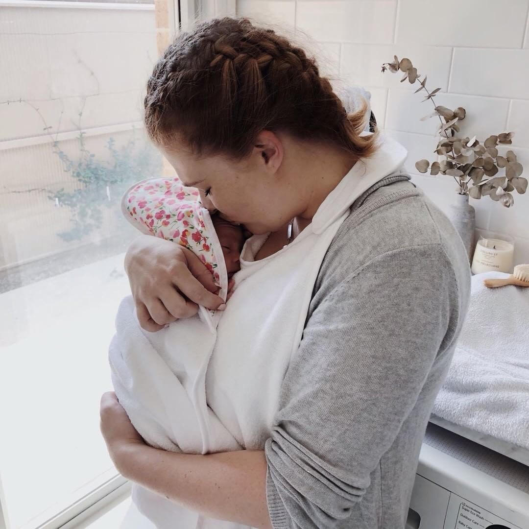 @handful.of.adventures using our Apron Baby Towel