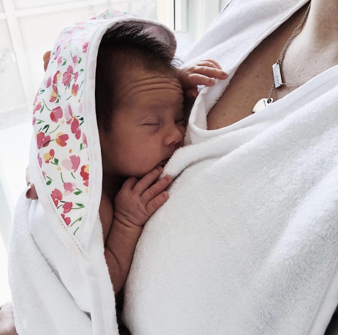 @handful.of.adventures using our Hands Free Baby Bath Towel