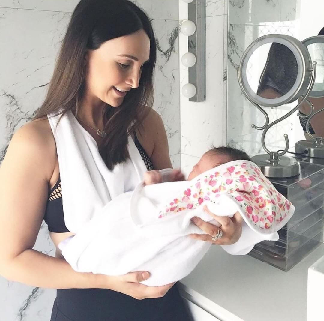 @milkboobsandbaby using our Apron-style Baby Bath Towel